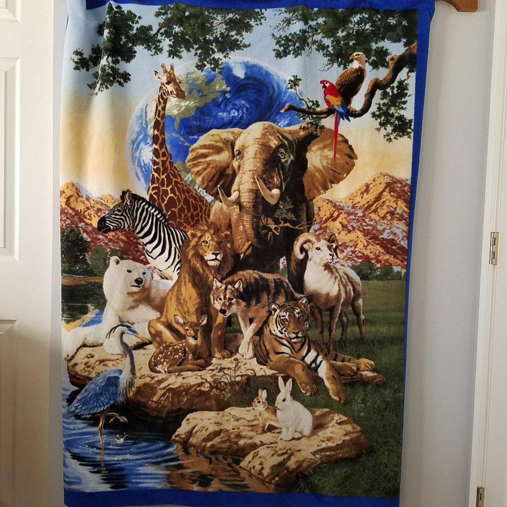 Handmade.Fleece blanket with animals print.
